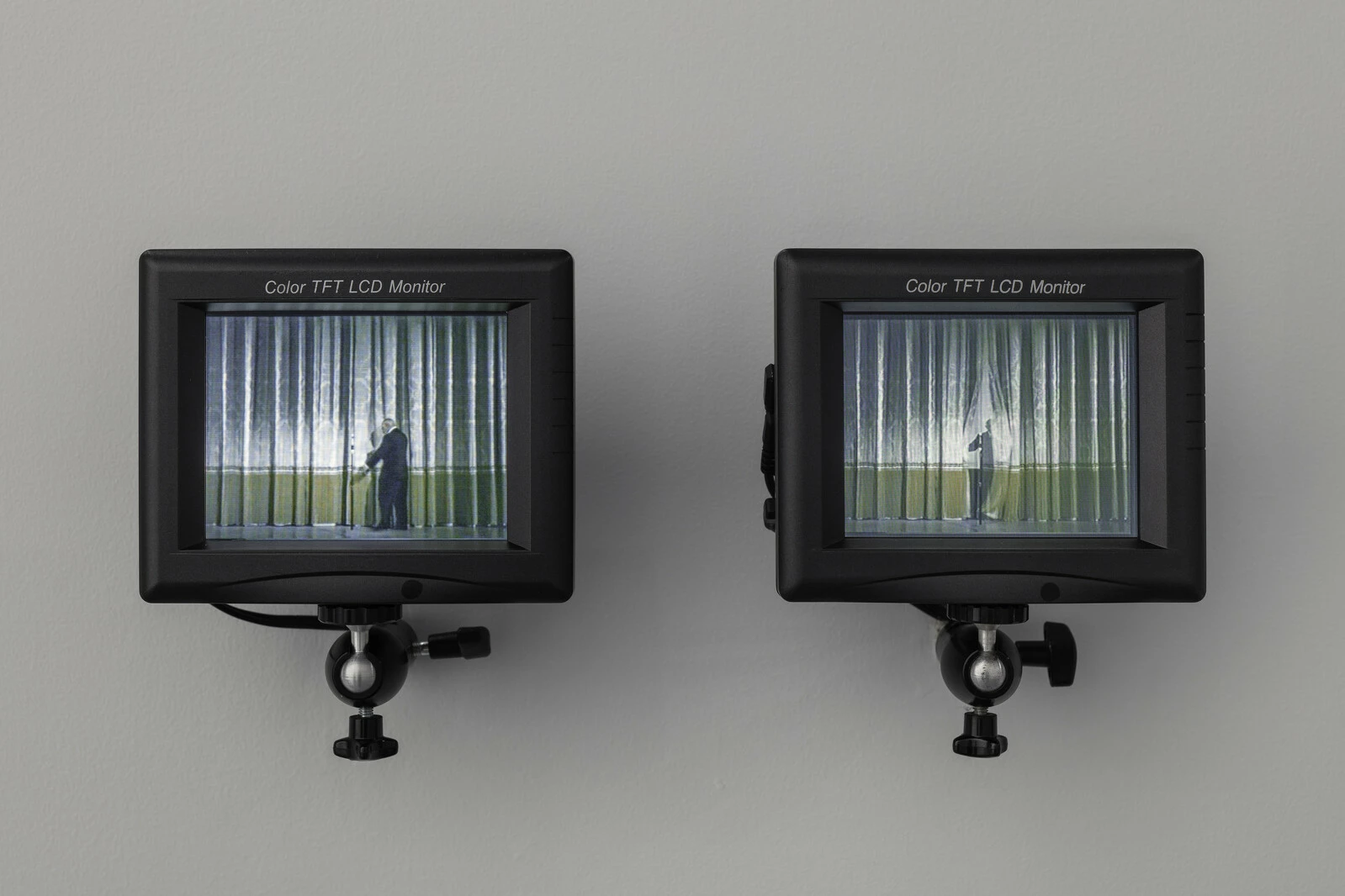Paul Pfeiffer, <em>Prologue to the Story of the Birth of Freedom</em>, 2000. Two digital videos (color, sound), LCD monitors, and metal armatures; 5 1/4 ×16 × 5 1/2 in. (13.3 × 40.1 × 14 cm); 4 minutes and 6 minutes. Collection of Chris Vroom, New York. © Paul Pfeiffer. Courtesy of the artist; Paula Cooper Gallery, New York; carlier | gebauer, Berlin/Madrid; Perrotin; and Thomas Dane Gallery, London. 2025/01/PPF_003.jpg 