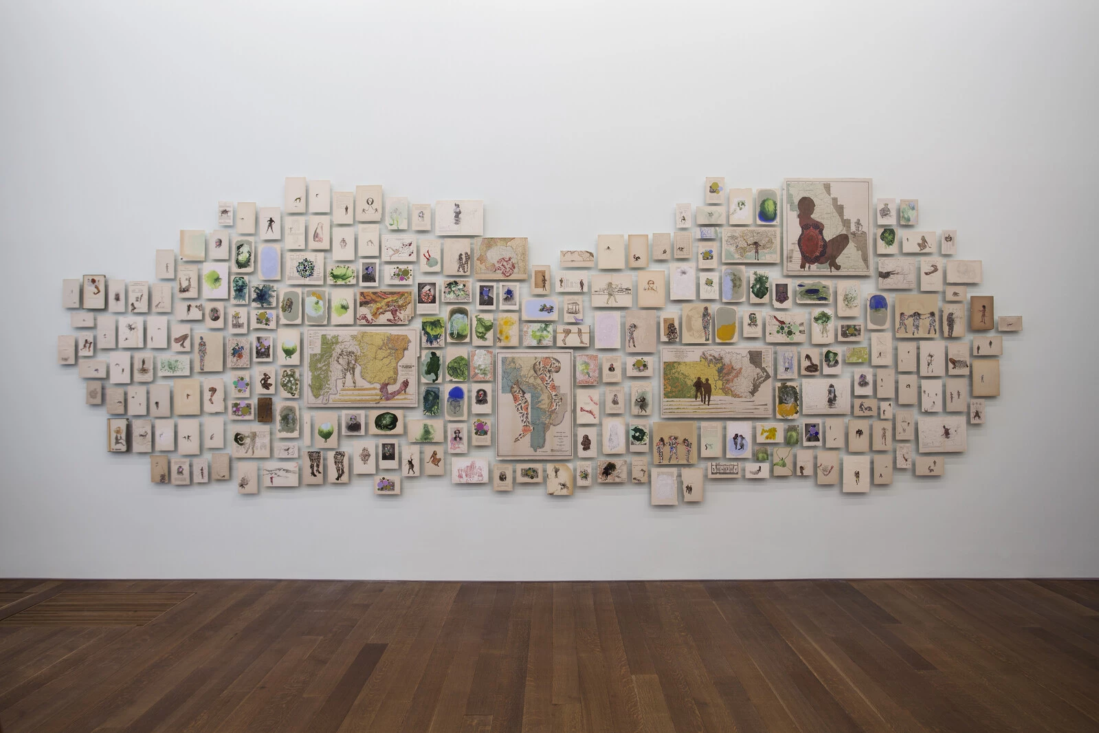 Firelei Báez, <em>Man Without a Country (aka anthropophagist wading in the Artibonite River)</em>, 2014–15. Gouache, ink, and chine-collé on 225 deaccessioned book pages; 106 1/4 × 252 in. (270 × 640 cm). Institute of Contemporary Art/Boston; Gift of Fotene Demoulas and Tom Coté. Image courtesy the artist and Hauser & Wirth, New York. © Firelei Báez. Photo: Oriol Tarridas. 2025/10/35_FB_Man-Without-a-Country.jpg 